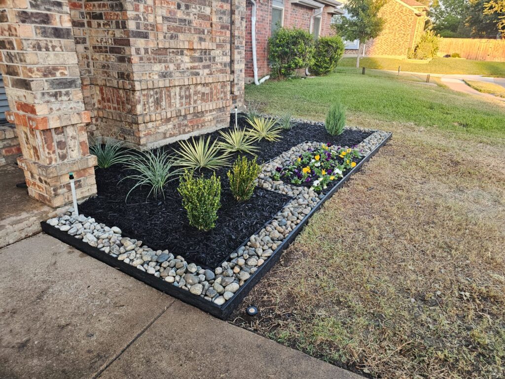 Stone border and garden bed installation